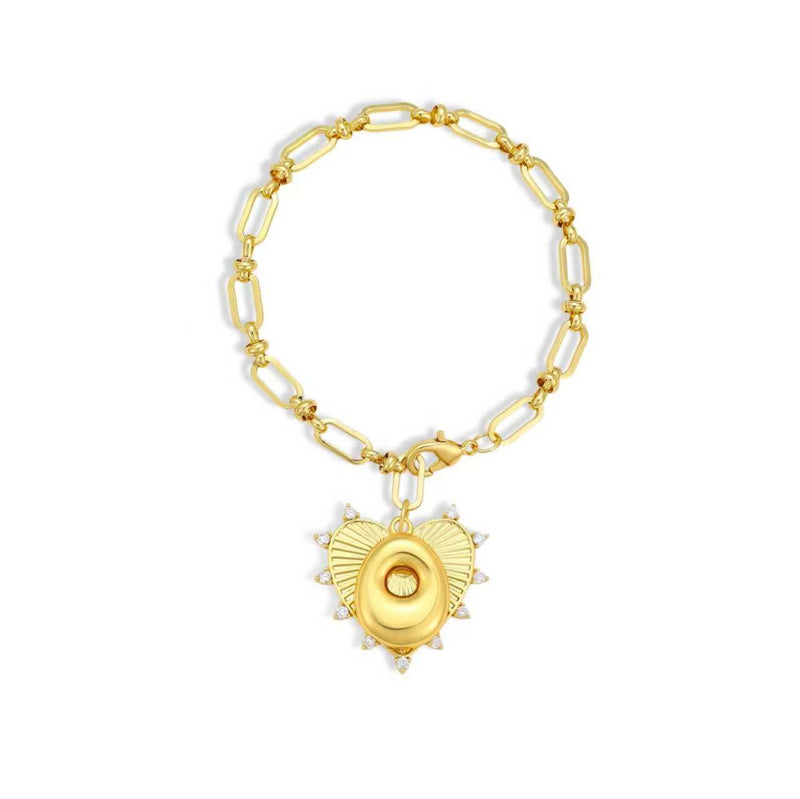 Gold chain bracelet with a heart-shaped charm and initial letter O over the heart charm on a white background