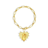 Gold chain bracelet with a heart-shaped charm and initial letter P over the heart charm on a white background