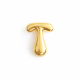 Glossy, balloon-style metal initial brooch pins in a playful, rounded design, available in multiple letters with a puffy, dimensional shape and metallic finish.