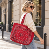 Model wearing Ellison+Young Bandana Market Tote Bag in Classic Red over shoulder