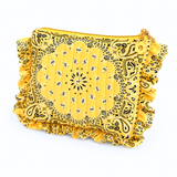 a bandana print ruffled and quilted pouch in yellow on white background