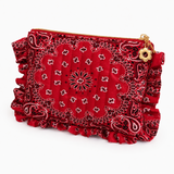 A red bandana-patterned clutch pouch with ruffled edges, a gold zipper, and a flower-shaped gold zipper pull, shown on a plain white background.