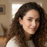 Set of two magnetic brooch pins or earrings featuring a classic black cameo silhouette with an elegant profile design, perfect for adding a vintage-inspired accent to scarves or other styled accessories.