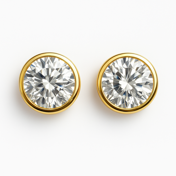 Statement stud earrings featuring bold bezel-set stones, designed to deliver striking sparkle and a sleek, modern silhouette for everyday elegance or special occasions.