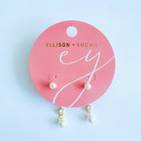 Elegant gold drop earrings featuring two luminous pearls in a contemporary linear design. The Celeste Double Pearl Earrings combine timeless sophistication with a modern gold finish, perfect for both casual and formal wear.