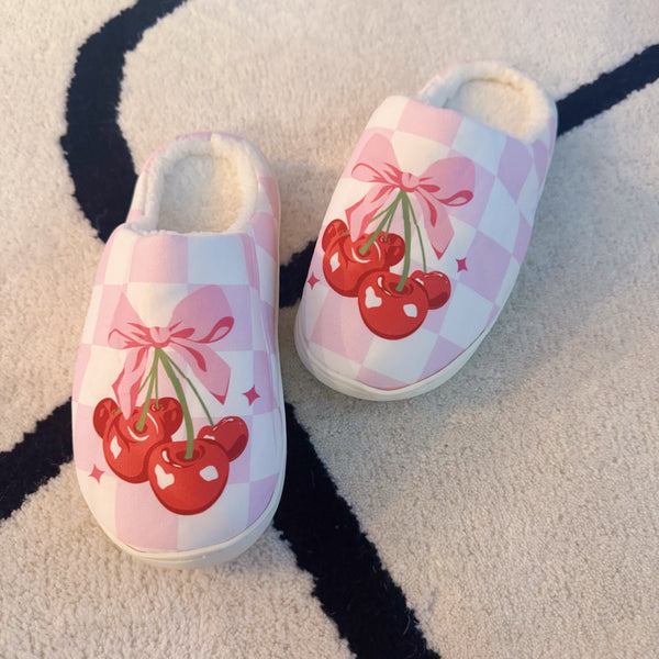 Indoor slippers with a playful cherry print on a soft pink background, round-toe design, available in multiple sizes