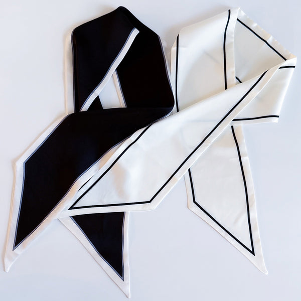 Elegant ribbon-style scarf with contrasting edges, perfect for adding a refined touch to hairstyles, handbag handles, or necklines.