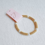 Stretch bracelet with natural pearls and gold accents – classic and comfortable everyday style