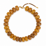 Necklace with brown beads on a white background