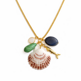 Gold chain necklace featuring a coastal-inspired pendant with a scallop shell charm, natural stone accents, and delicate gold details for a layered seaside look.
