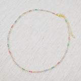 Delicate ball chain necklace featuring multicolor beads for a playful, vibrant look—perfect for layering or wearing solo to brighten up any outfit.