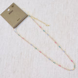 Delicate ball chain necklace featuring multicolor beads for a playful, vibrant look—perfect for layering or wearing solo to brighten up any outfit.