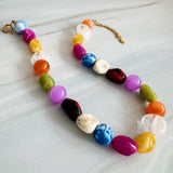 Colorful irregular shapes of beads in a necklace