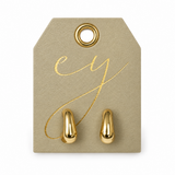 Ellison+Young Cove Hoop Earrings displayed on a faux leather packaging card with gold foil engraved logo