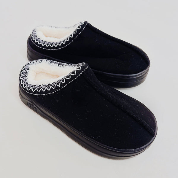 Soft fleece-lined indoor slippers in cream, black, and camel colors with round-toe design, available in multiple sizes