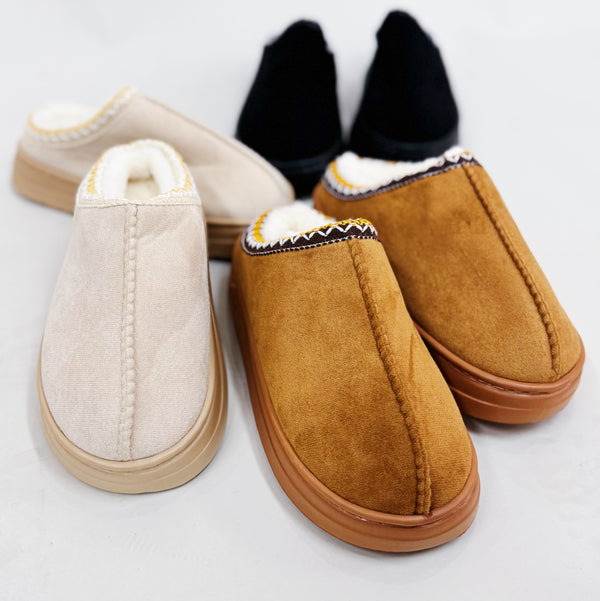 Soft fleece-lined indoor slippers in cream, black, and camel colors with round-toe design, available in multiple sizes