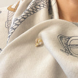 Gold-tone bee-shaped brooch or earrings with sparkling crystal-encrusted wings and a textured body, designed as a magnetic pin set for styling scarves or garments; comes in a set of two.