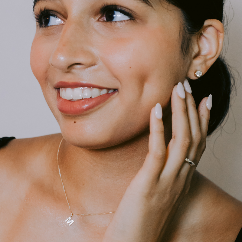 DIAMOND-14K-GOLD-MIA-INITIAL-CHARM-ON-MODEL