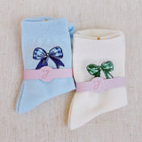 Set of two soft everyday socks featuring a delicate bow design, combining a touch of sweetness with cozy comfort for daily wear.