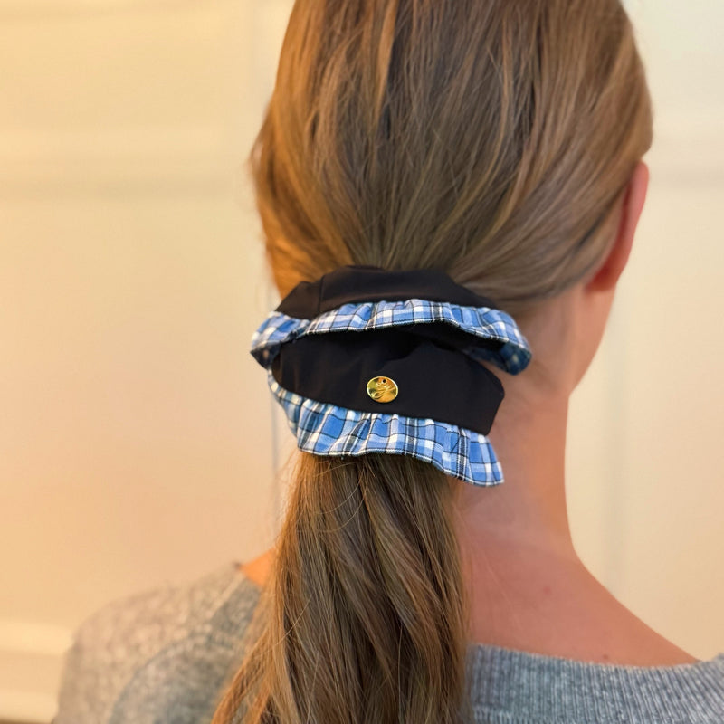 Chic hair scrunchie with a classic preppy design, featuring bold contrasting borders and a tailored look—perfect for polished, everyday styling