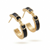 Gold hoop earrings with black accents on a white background