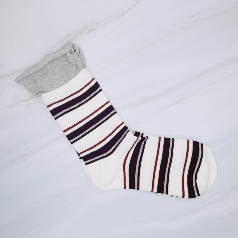 Bold and stylish set of two socks featuring edgy striped patterns and sassy color combinations—perfect for adding attitude and flair to any outfit.
