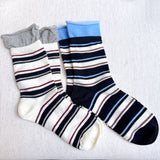 Bold and stylish set of two socks featuring edgy striped patterns and sassy color combinations—perfect for adding attitude and flair to any outfit.