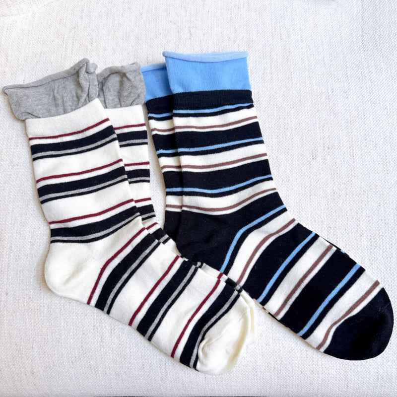 Bold and stylish set of two socks featuring edgy striped patterns and sassy color combinations—perfect for adding attitude and flair to any outfit.