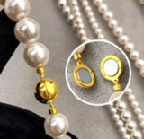 Set of two versatile pearl necklaces featuring luminous pearls in varying sizes, designed with magnetic clasps for easy wear and styling; can be worn individually or linked together for a longer layered look.