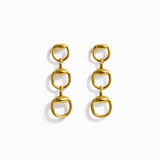 Gold-tone drop earrings featuring three interlocking links inspired by classic horse bit and equestrian motifs. The polished finish and articulated structure create elegant movement and a refined, timeless statement style.
