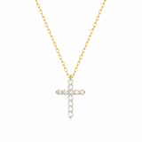 Gold necklace with a cross pendant on a white background