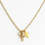 Gold-toned dual cross necklace featuring two layered cross pendants on a delicate chain for a bold, faith-inspired look