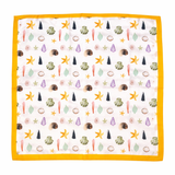 Square fabric with sea-themed pattern on a white background