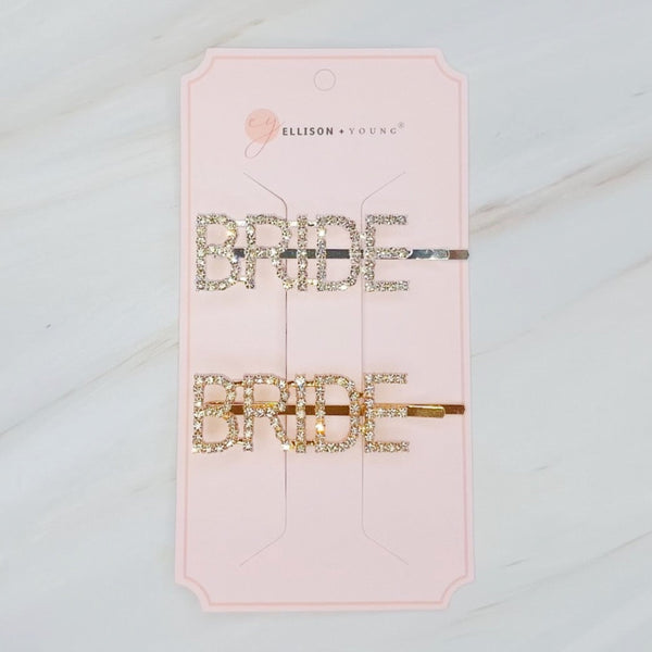 Elegant set of two gold and silver hair pins featuring sparkling "Bride" lettering and glam crystal accents—perfect for bridal showers, bachelorette parties, or wedding day styling.