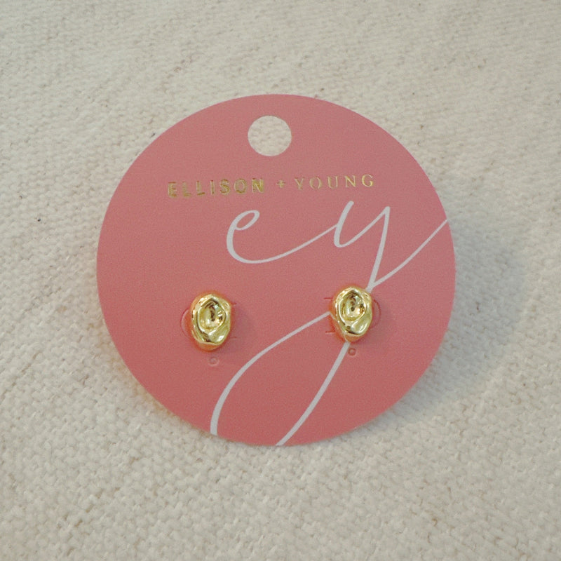 Gold-tone dome stud earrings with a smooth, pebble-like shape and a polished finish for a modern, minimalist look.