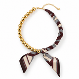 Golden Bead Scarf-Tie Necklace in Brown – gold-tone bead strand with burgundy and cream striped scarf wrap and tie, lobster clasp and extender