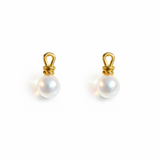 Elegant pearl drop earrings featuring smooth white pearls suspended from sculpted gold loops. The design blends modern artistry with timeless sophistication, creating a refined accessory for everyday or formal wear.