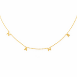 Gold chain necklace featuring spaced letter charms that spell “NANA” in a polished gold finish, designed as a meaningful everyday or giftable piece.