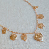 Heart Lockets Multi Charm Necklace
Golden