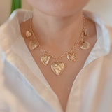 Heart Lockets Multi Charm Necklace
Golden