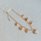 Heart Lockets Multi Charm Necklace
Golden