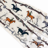 Fabric with horse and equestrian pattern on a white background