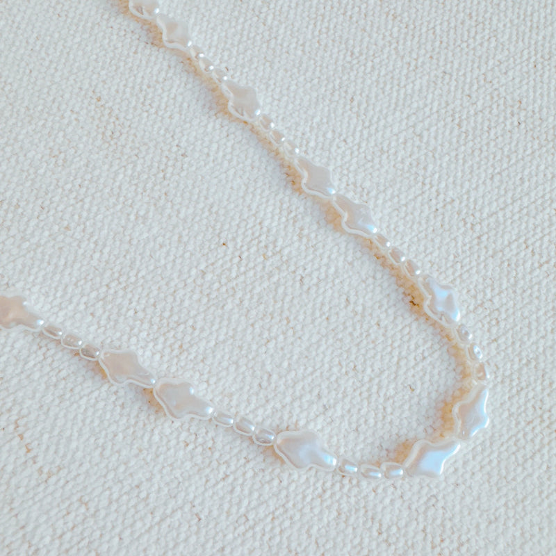 Luminous Pearl Cross Necklace