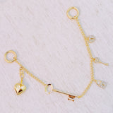 Gold bag charm with key, lock, and ring details – elegant purse accessory