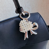 Knitted Pearl Heart Silver Bow Bag Charm