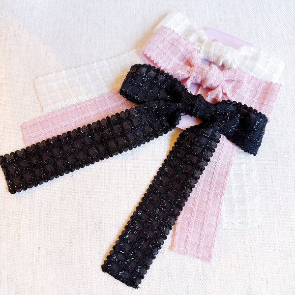 Lovely set of three bow hair clips made from soft lace fabric—perfect for adding a romantic and feminine touch to any hairstyle.