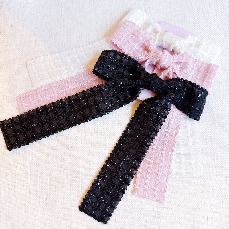 Lovely set of three bow hair clips made from soft lace fabric—perfect for adding a romantic and feminine touch to any hairstyle.