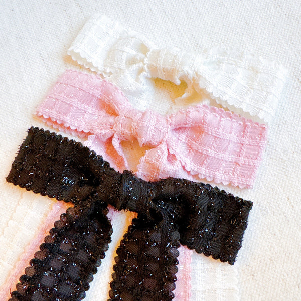 Lovely set of three bow hair clips made from soft lace fabric—perfect for adding a romantic and feminine touch to any hairstyle.