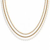 Three gold necklaces on a white background