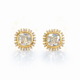 Elegant stud earrings featuring a stone encircled by small sparkling crystals, all set in a polished gold frame. The cushion-cut center gem catches the light beautifully, creating a timeless and sophisticated look.